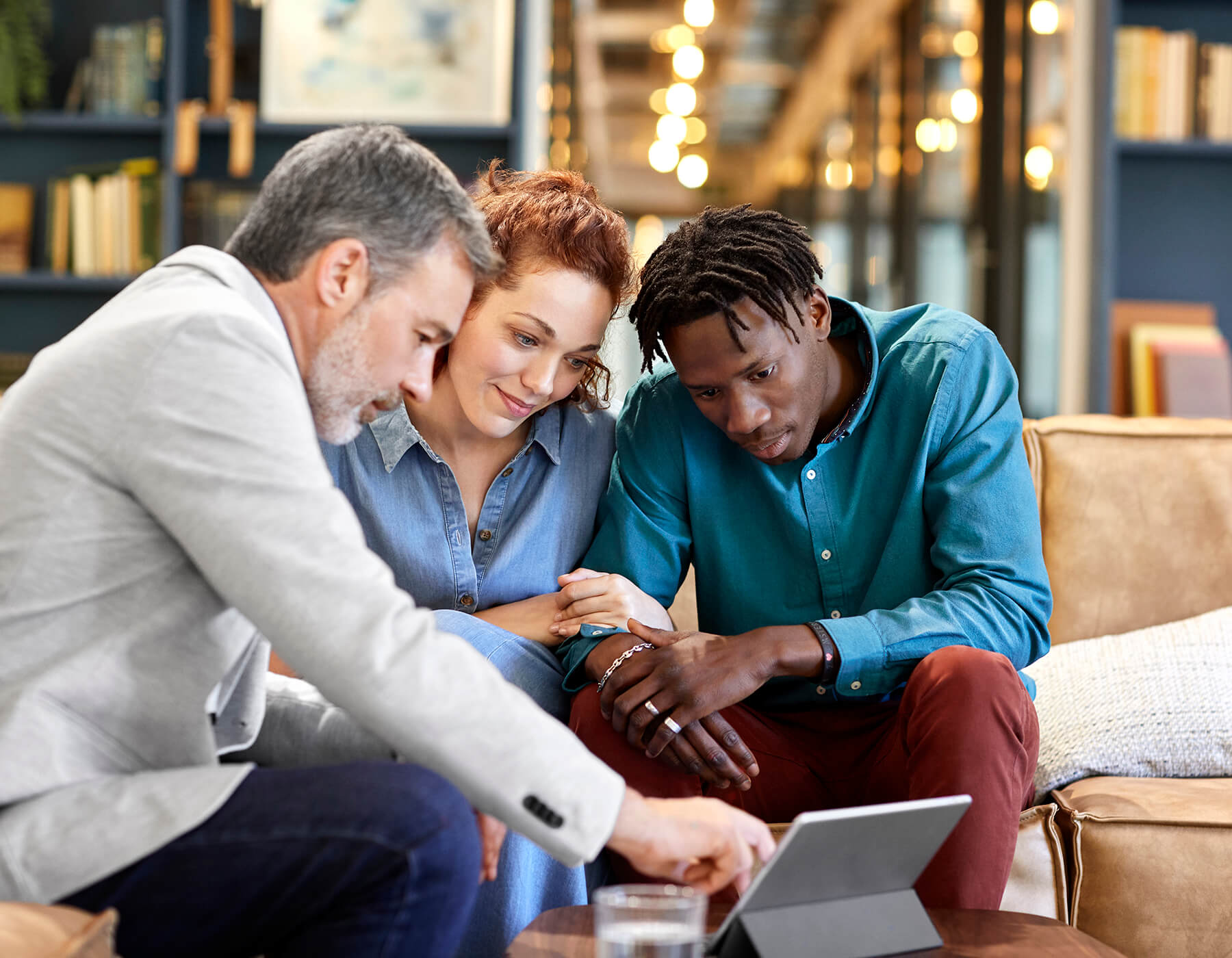 financial advisor planning investment with couple